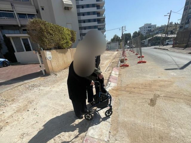 המדרכה המפורקת (צילום: אלי סיטרין)